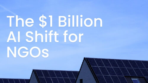 Graphic headline on a blue sky background reading 'The $1 Billion AI Shift for NGOs' over solar-panel rooftops. It communicates a focus on funding AI for NGOs.